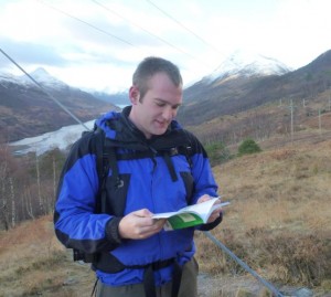 Thomas reading a map in Scotland